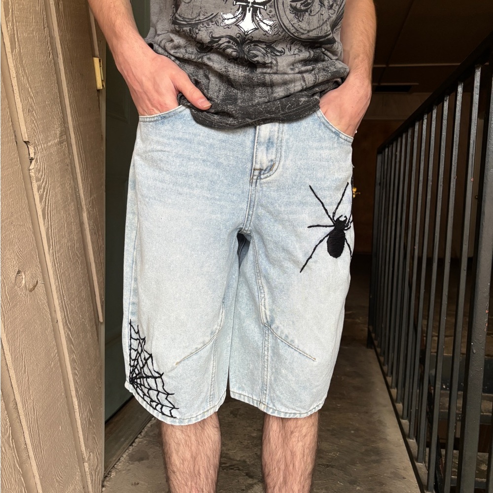 Stylish Light Blue Denim Shorts with Spider Design